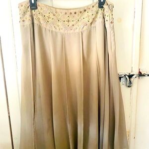 Fully lined cream colored  swing skirt with beaded jewel details size 14